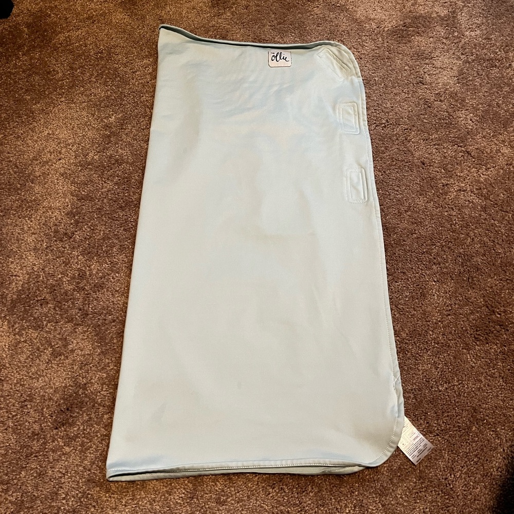 Ollie swaddle in sky